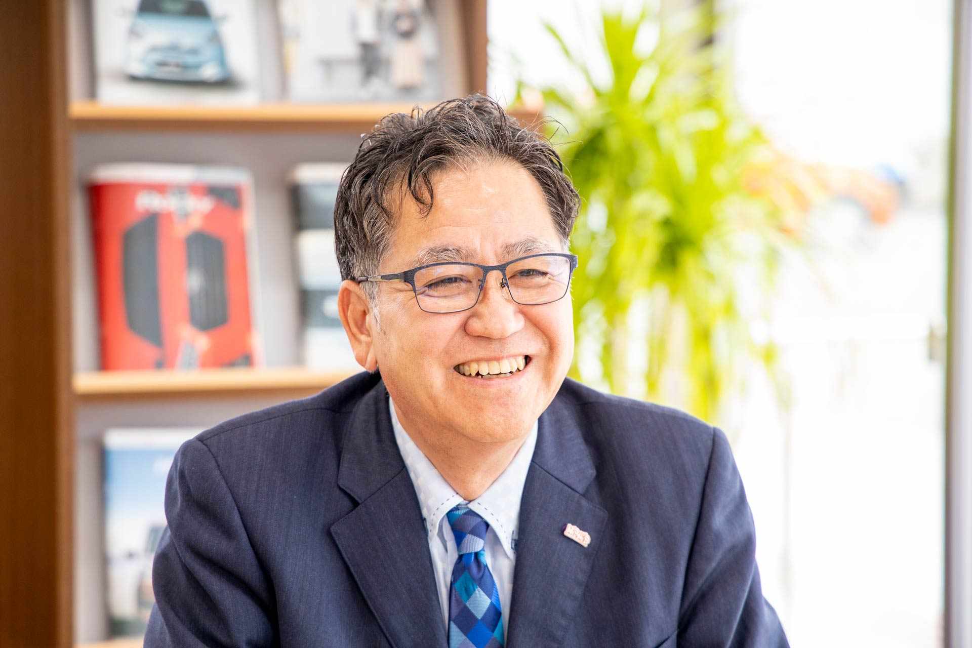 株式会社 西自動車商会 代表取締役 津嘉山 修